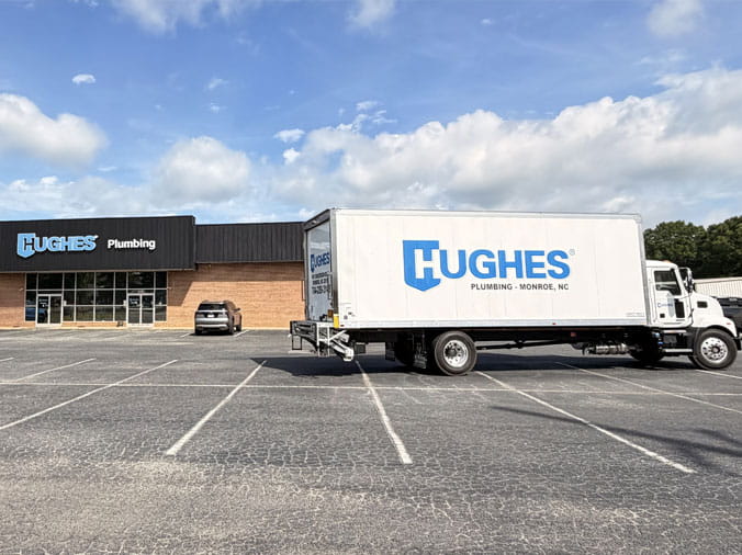 Hughes Supply Monroe NC delivery truck parked in front of location